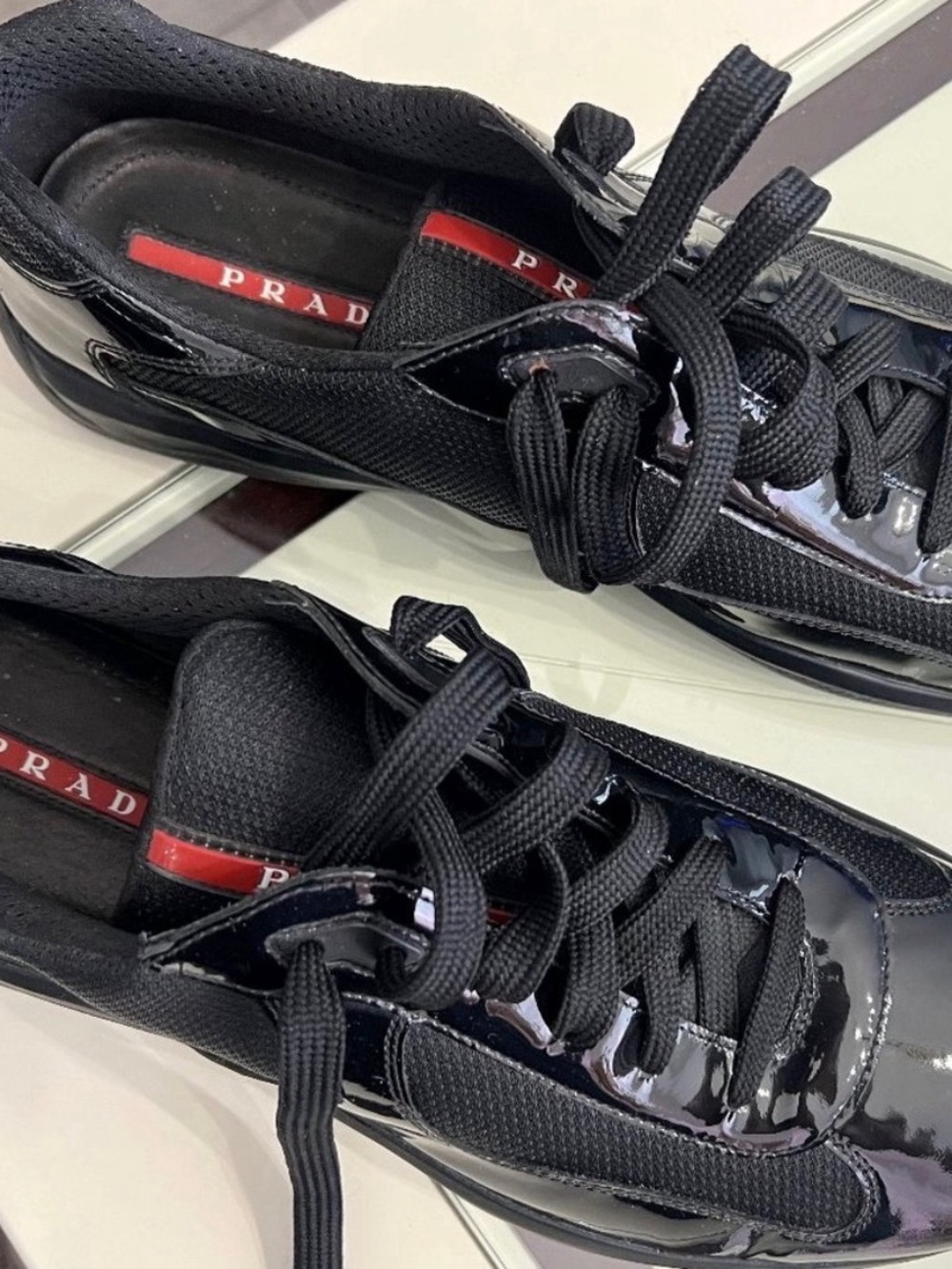 Prada Black Patent & Mesh Low-Top Sneakers with Red Logo Stripe